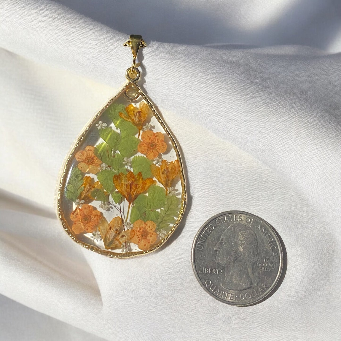 Dry Pressed Leaves with Orange Plum Blossoms and Orange Wild Flowers with pieces of Queen Anne’s Lace