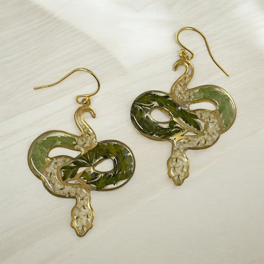Snake Shape filled with pieces of Queen Anne’s Lace and Fern