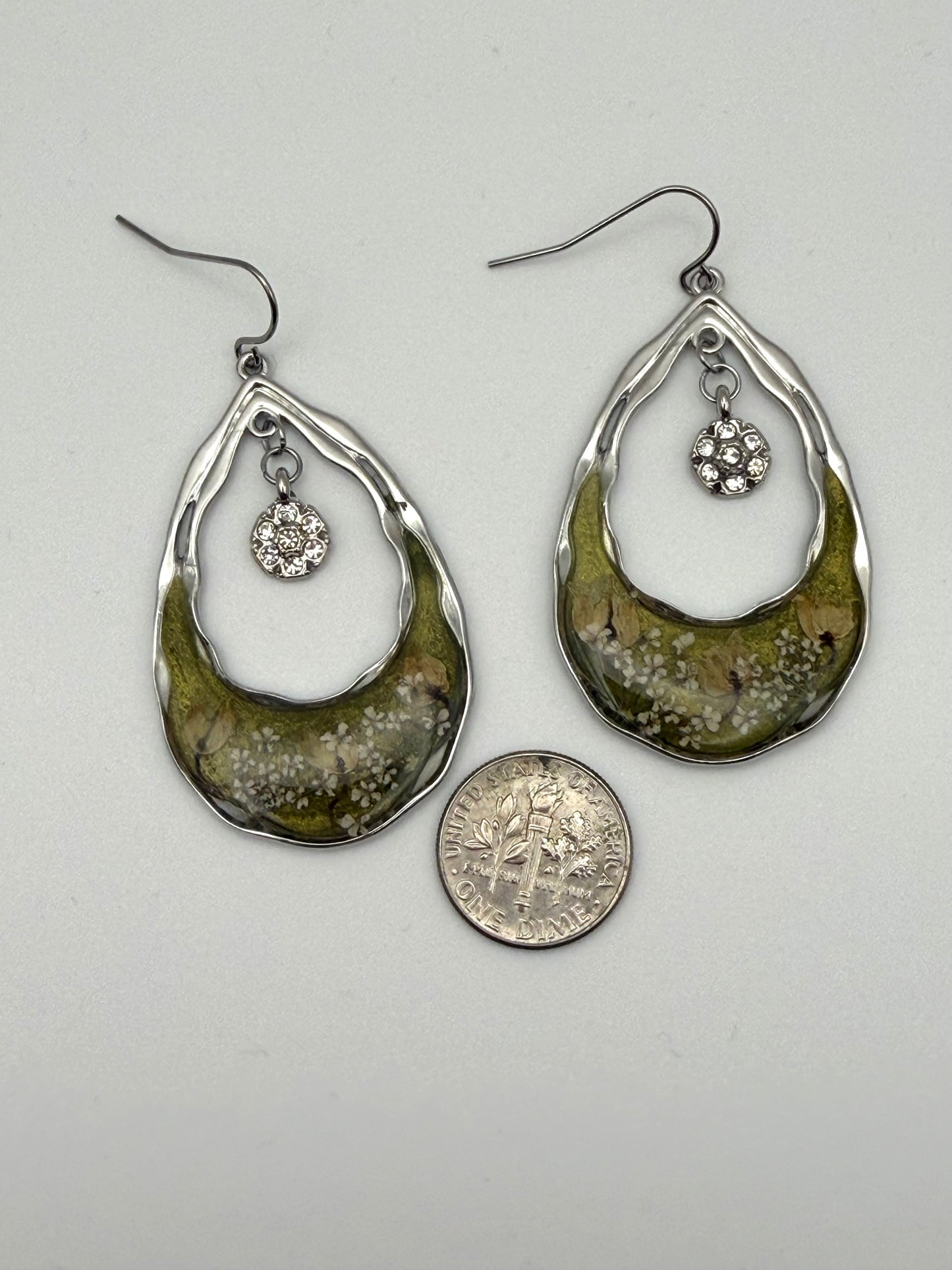 Green Mica Powder with Lily of the Valley, and Queen Anne’s Lace with dangling charms