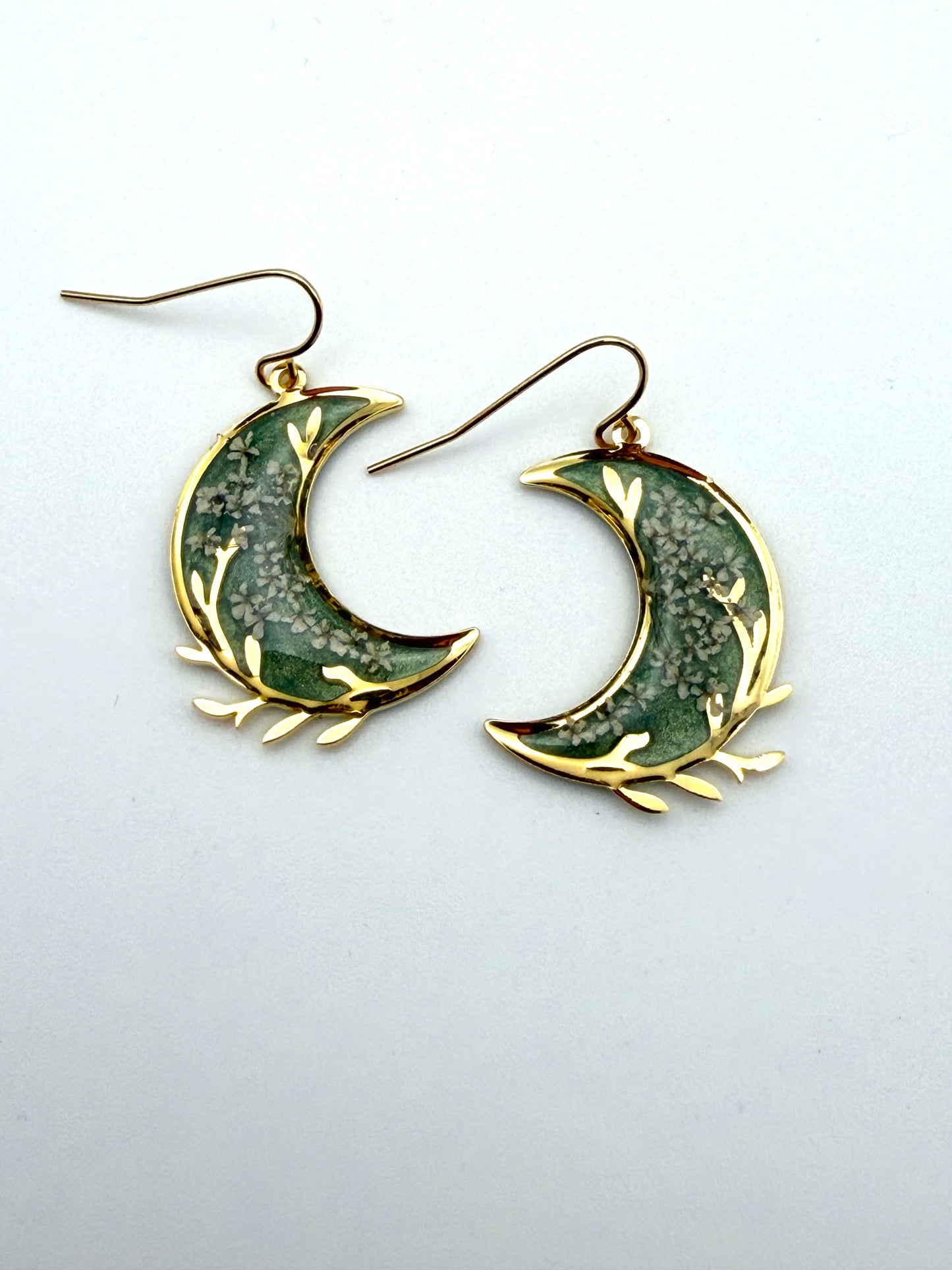 Gold Plated Crescent Moons filled with Aquamarine Green Mica Powder and Queen Anne’s Lace
