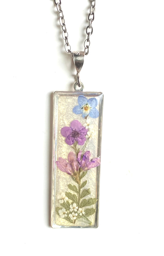 Dry Pressed Fern with Purple Plum Blossom, Blue Forget-Me-Nots, Purple Wild Flower with pieces of Queen Anne’s Lace