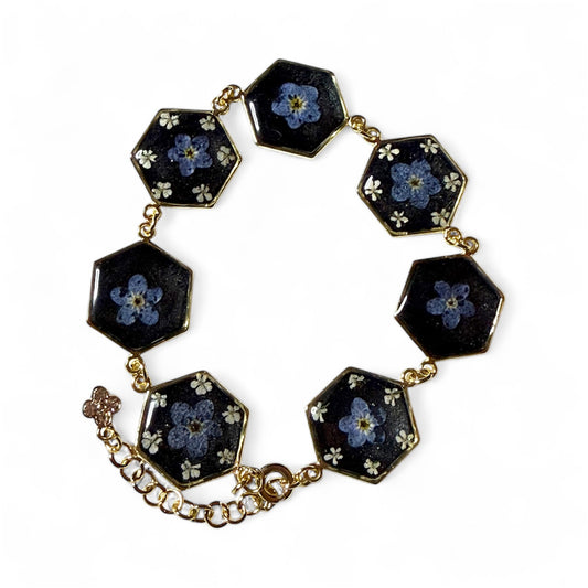 Gold Colored Bracelet with Forget-Me-Nots and pieces of Queen Anne’s Lace