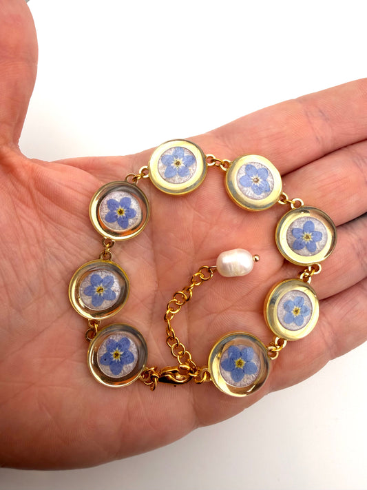 Gold Colored Bracelet with Opal Mica Powder and Forget-Me-Nots