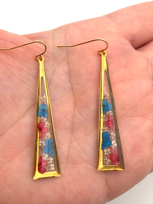 Red and Blue Plum Blossoms with Pieces of Queen Anne’s Lace