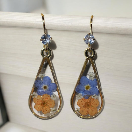 Orange Plum Blossoms with Blue Forget-Me-Nots and pieces of Queen Anne’s Lace