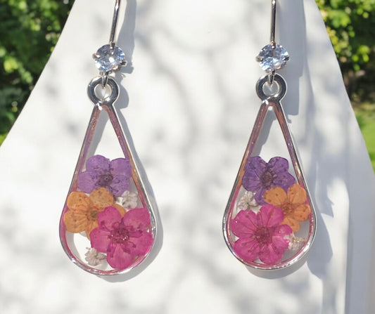 Orange, Purple and Pink Plum Blossoms with pieces of Queen Anne’s Lace