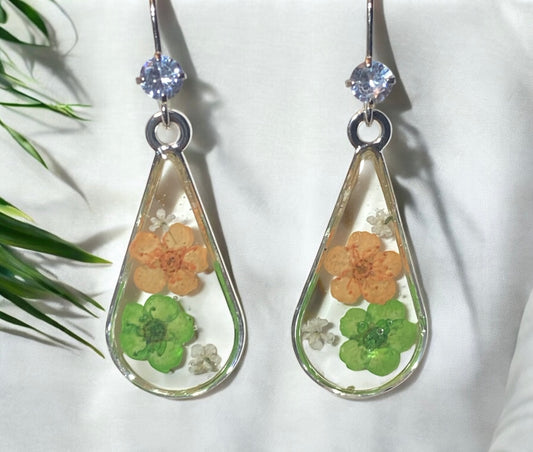 Orange and Green Plum Blossoms with pieces of Queen Anne’s Lace