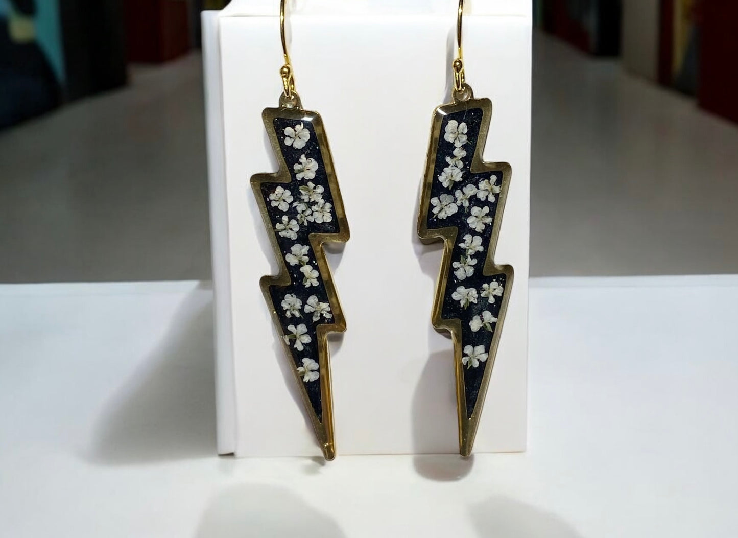 Lightening Bolts filled with Black Mica Powder and pieces of Queen Anne’s Lace filled in