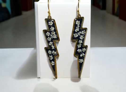 Lightening Bolts filled with Black Mica Powder and pieces of Queen Anne’s Lace filled in