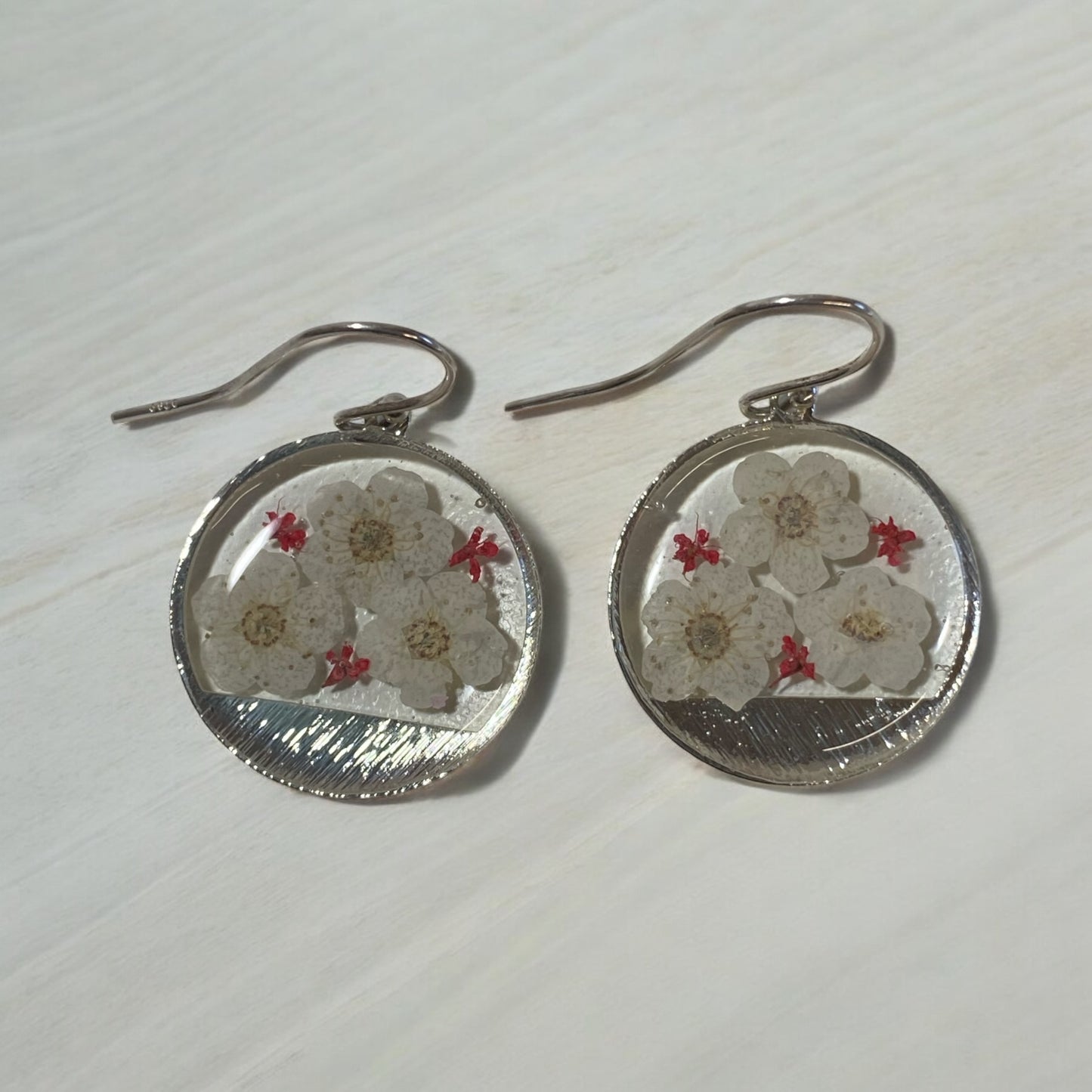 White Plum Blossoms with pieces of Red Queen Anne’s Lace