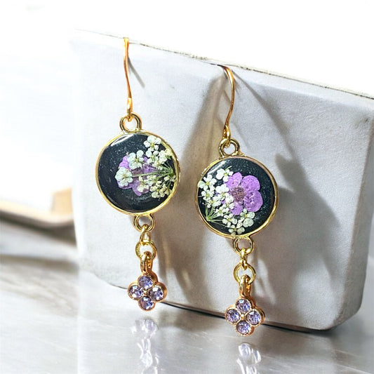 Black Colored Mica Powder with Purple Plum Blossoms, Queen Annes Lace and a Purple Rhinestone Charm