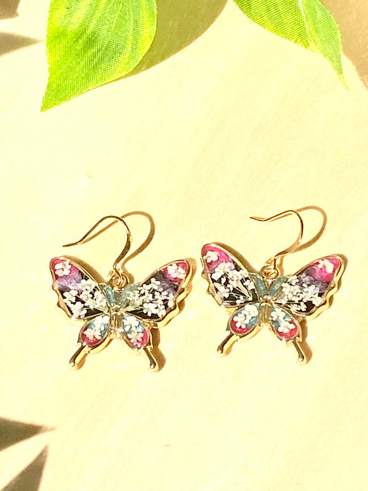 Butterfly Bezels filled with Mica Powder pieces of Queen Anne’s Lace,and  Purple Wild Flowers