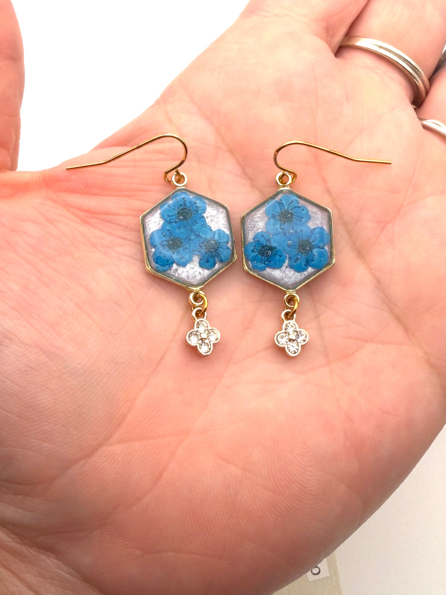 Opal Colored Mica Powder with Blue Plum Blossoms and a Dangling Rhinestone Charm